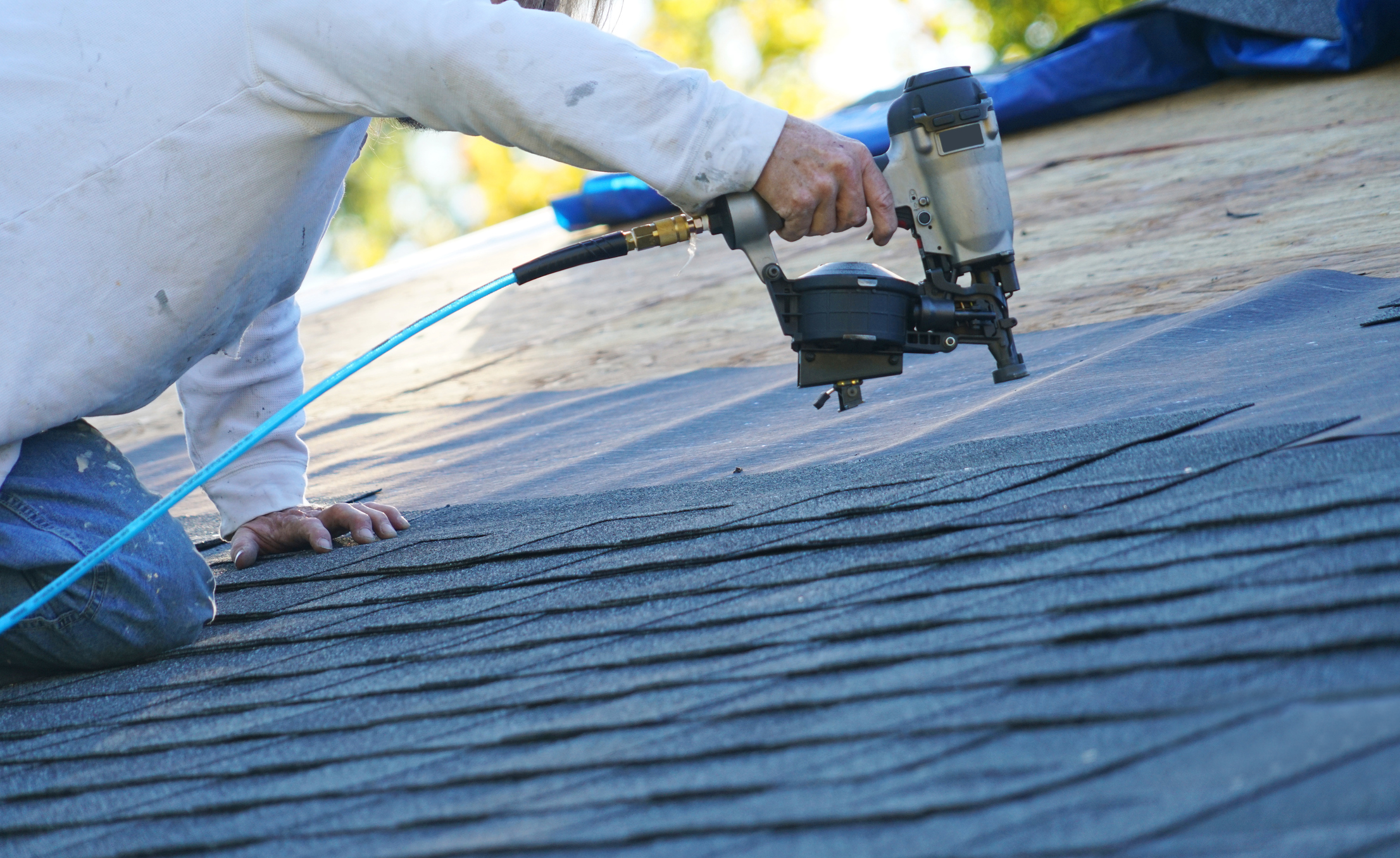 Damaged roof repair in Huntington Station, NY after weather-related roof issues
