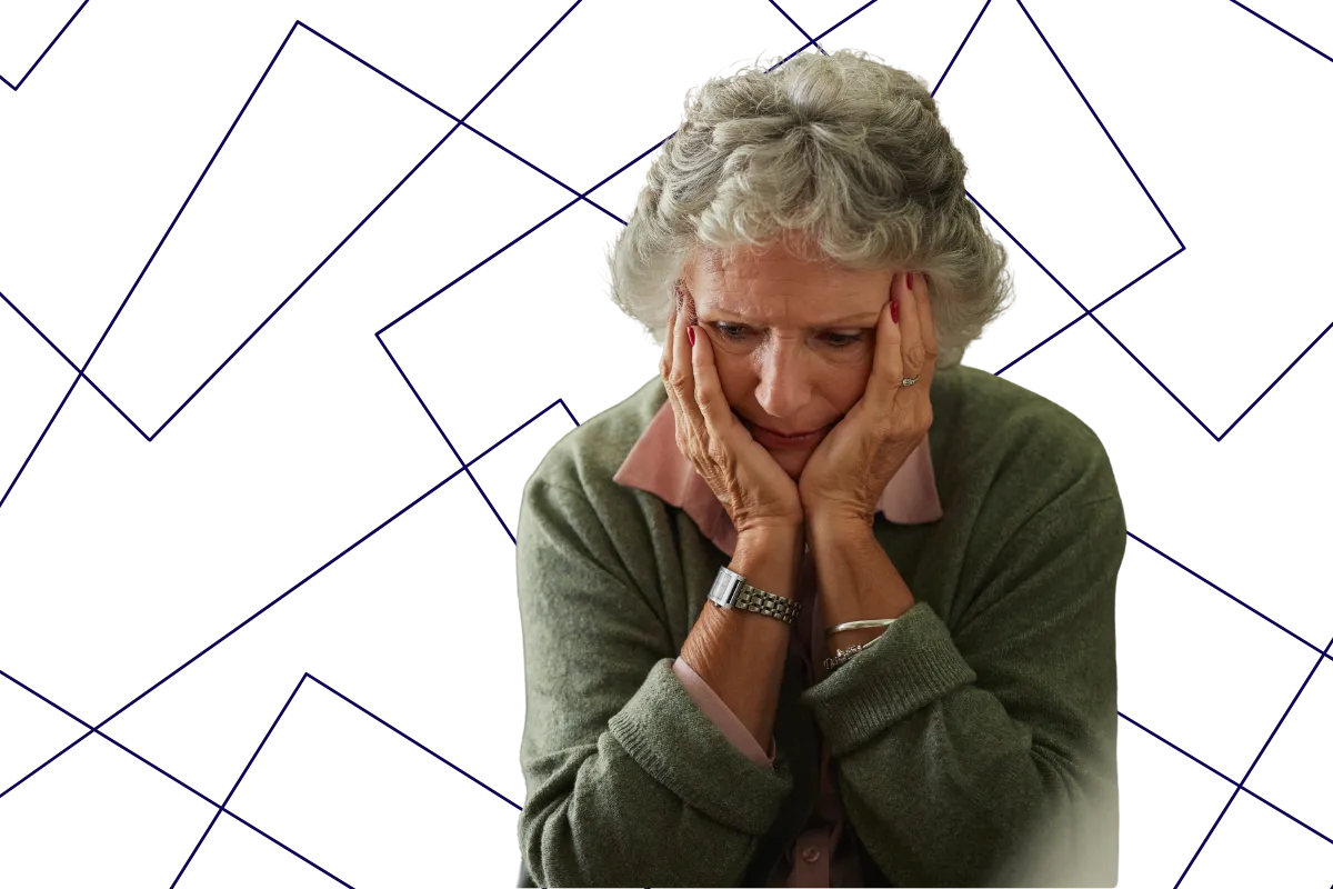 Elderly woman cupping her frowning face, representing common Medicare enrollment mistakes seniors make.