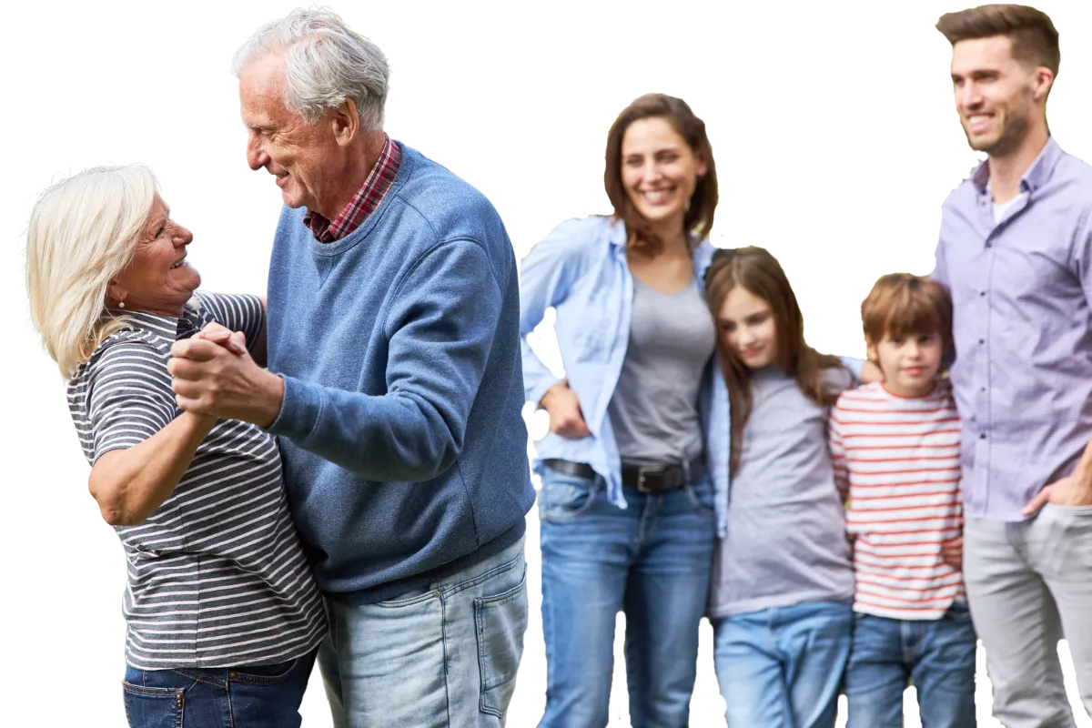 Smiling elderly couple with their children and grandchildren, illustrating peace of mind from setting up final expense insurance.