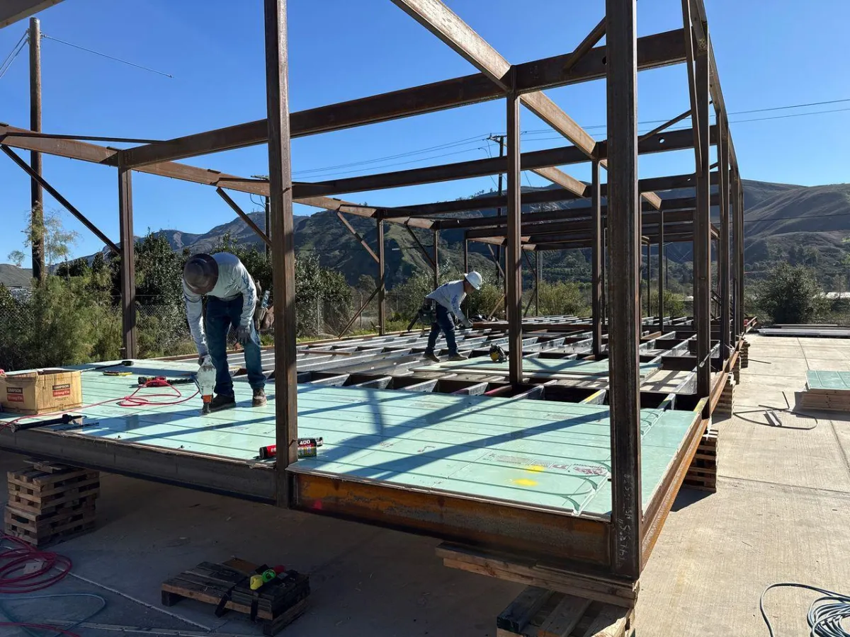 Hydronic system design and engineering in progress for a custom Southern California build, featuring precision floor panel layout and structural coordination for high-performance radiant heating and cooling.