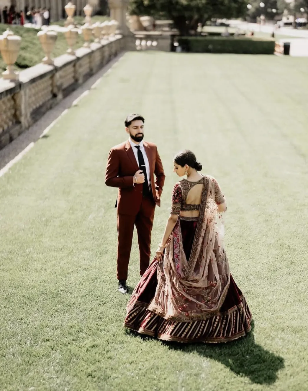 angel statue in front of window