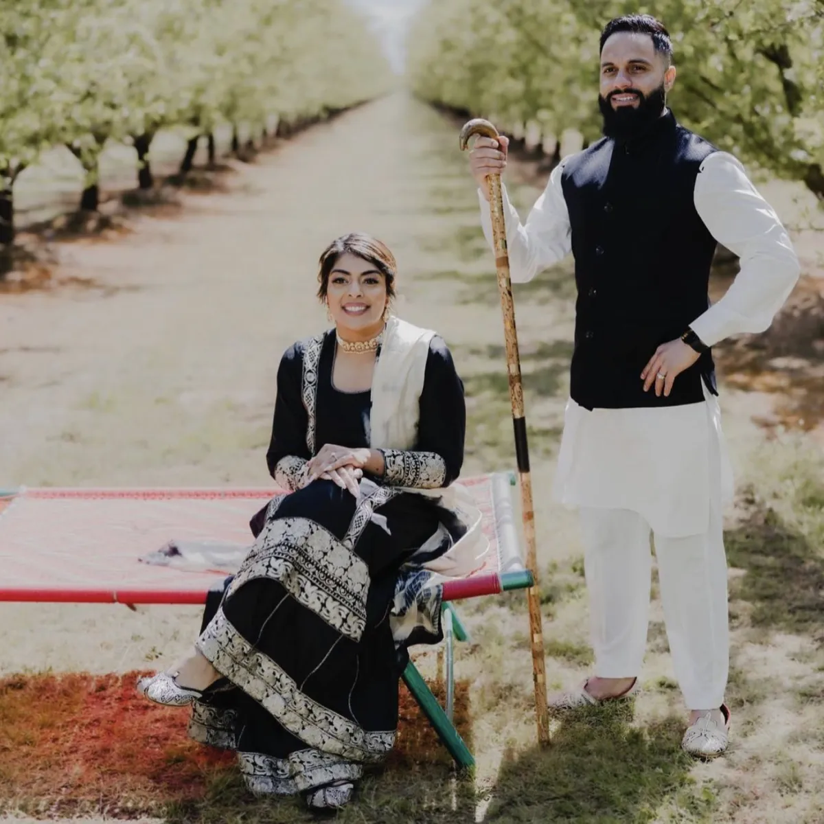 man in black jacket walking on pedestrian lane during daytime
