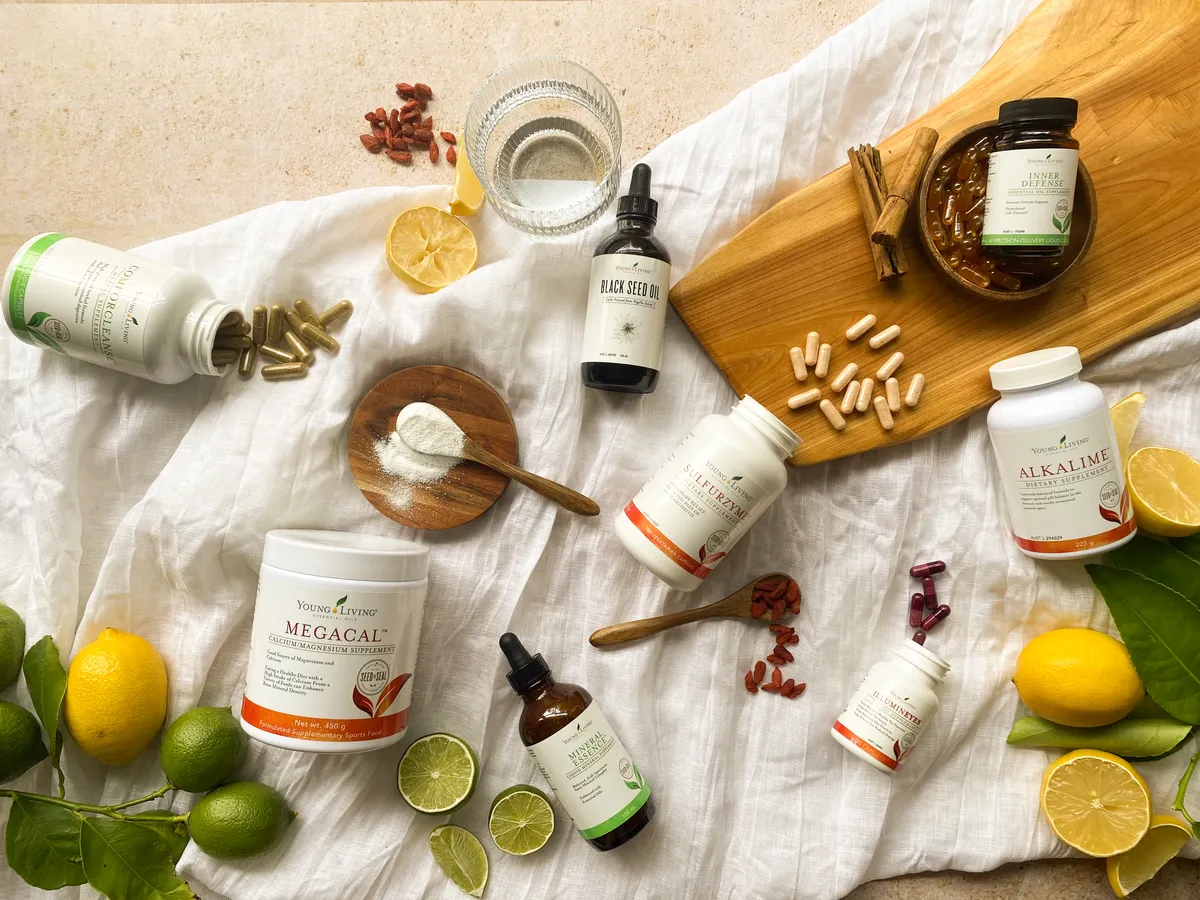 Young Living nutrition products in a natural flat lay