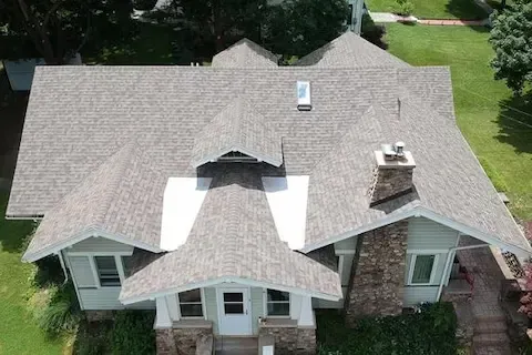 Aerial view of completed multi-pitch shingle roof replacement in Coon Rapids by Coon Rapids Roofing Pros