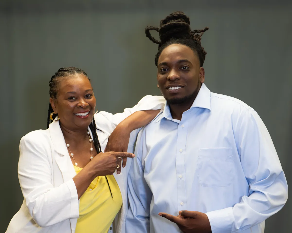 A hand clicking a laptop 'Enroll Now' button, symbolizing decisive action for a new insurance career.