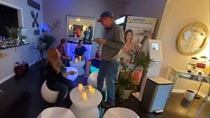 Atmosphere inside the AWAREmed Oxygen Bar with guests enjoying oxygen therapy lounge setting