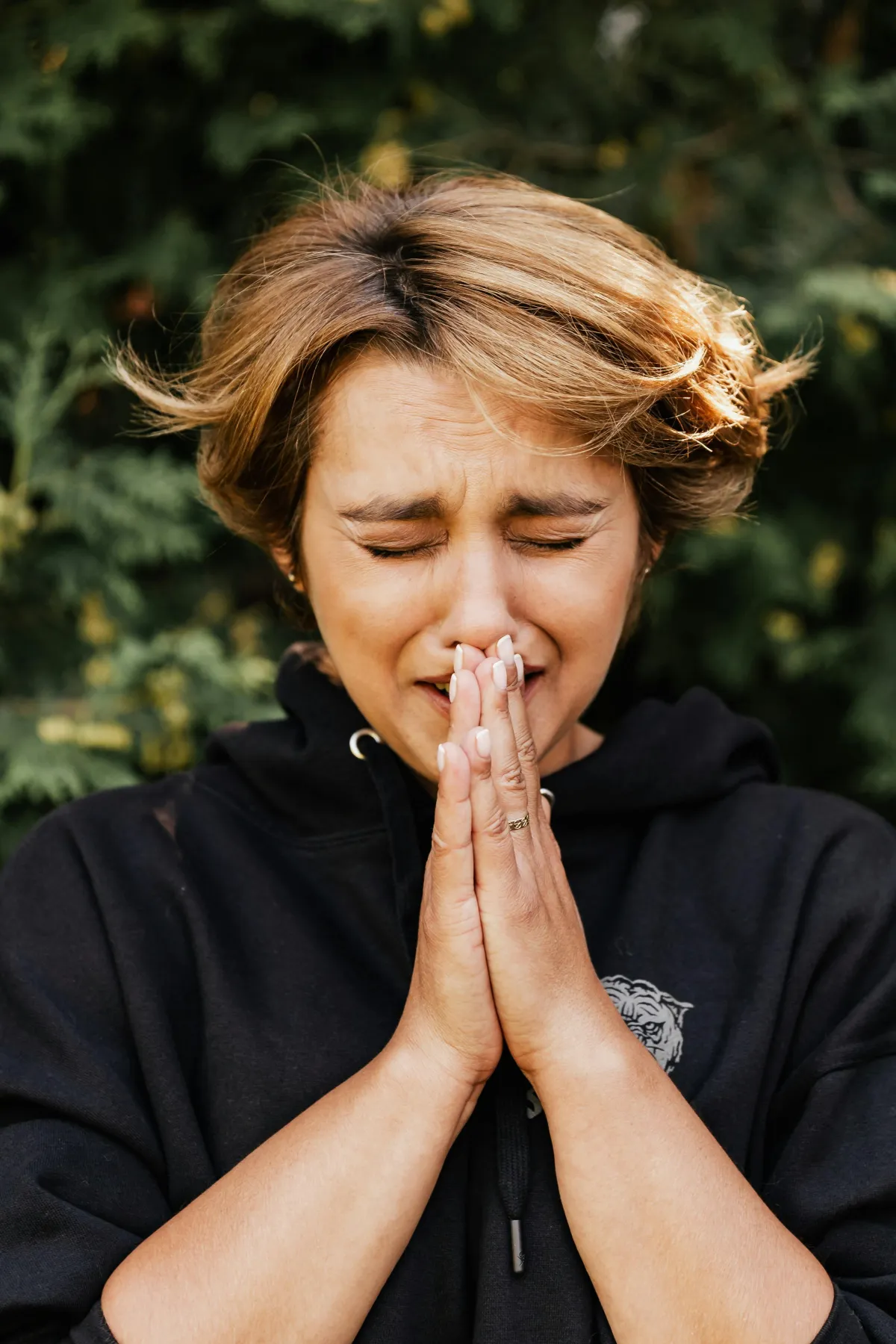 woman praying tears