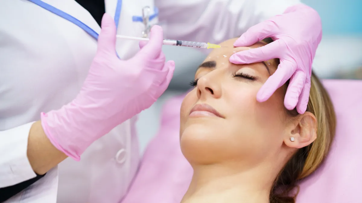 Woman getting Botox for crow's feet