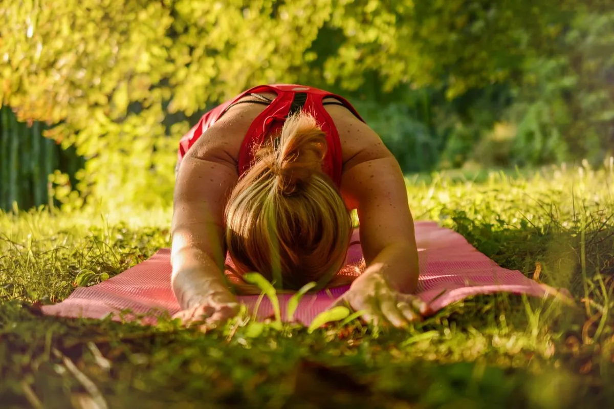 woman practicing yoga 