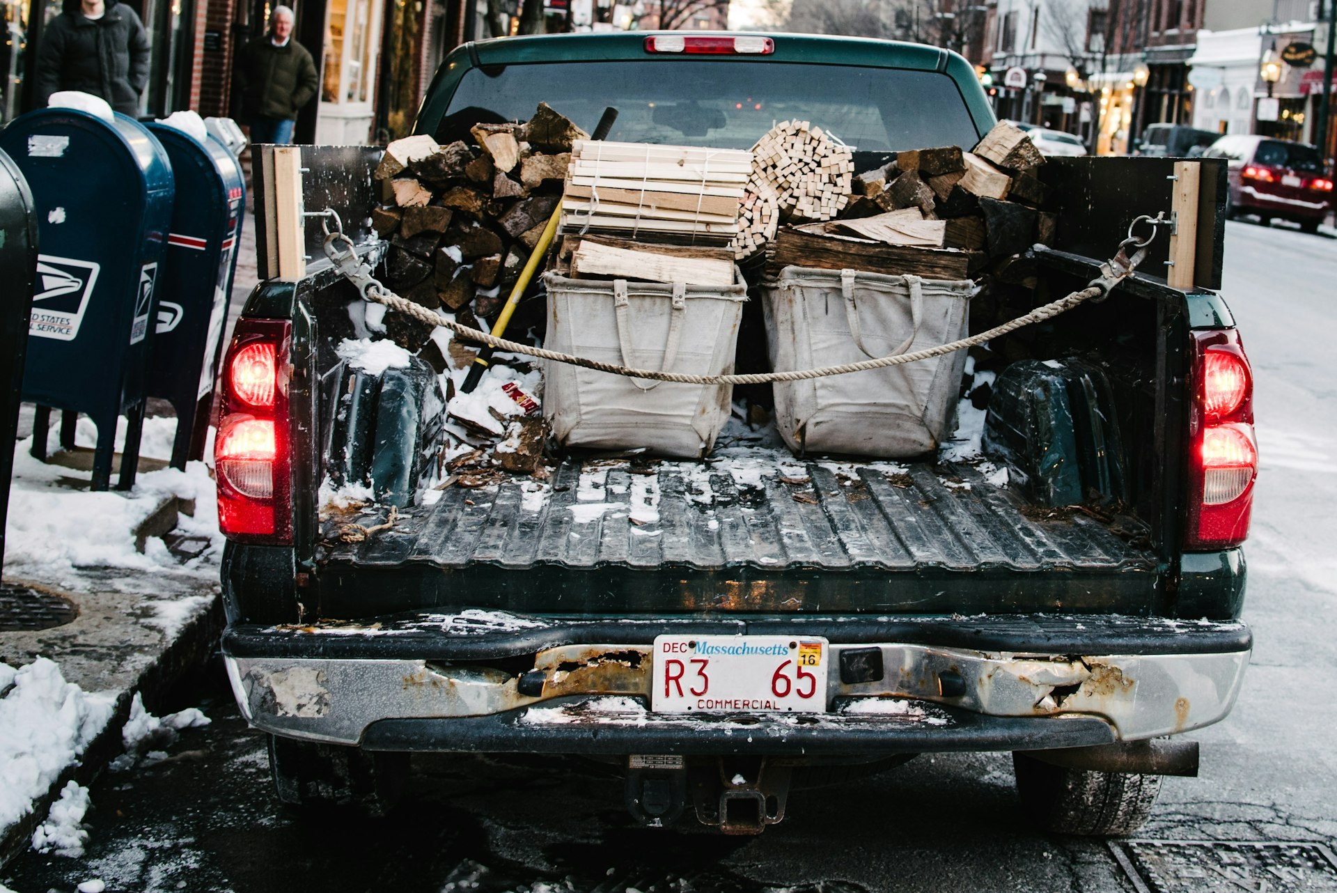 Truck bed loaded with split firewood - Blanco's Hauling and Handyman Service in San Bernardino