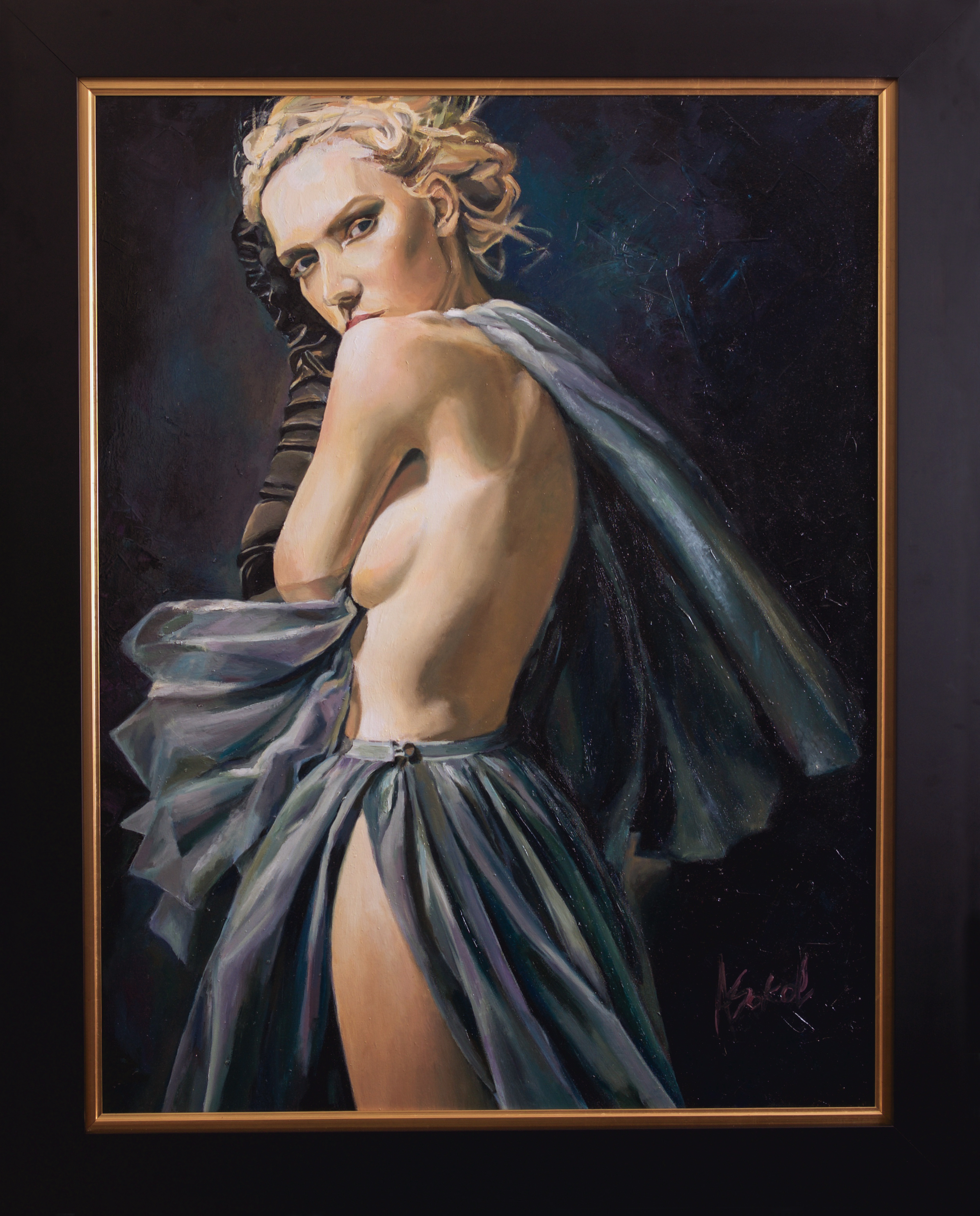 person with tattoo on right arm