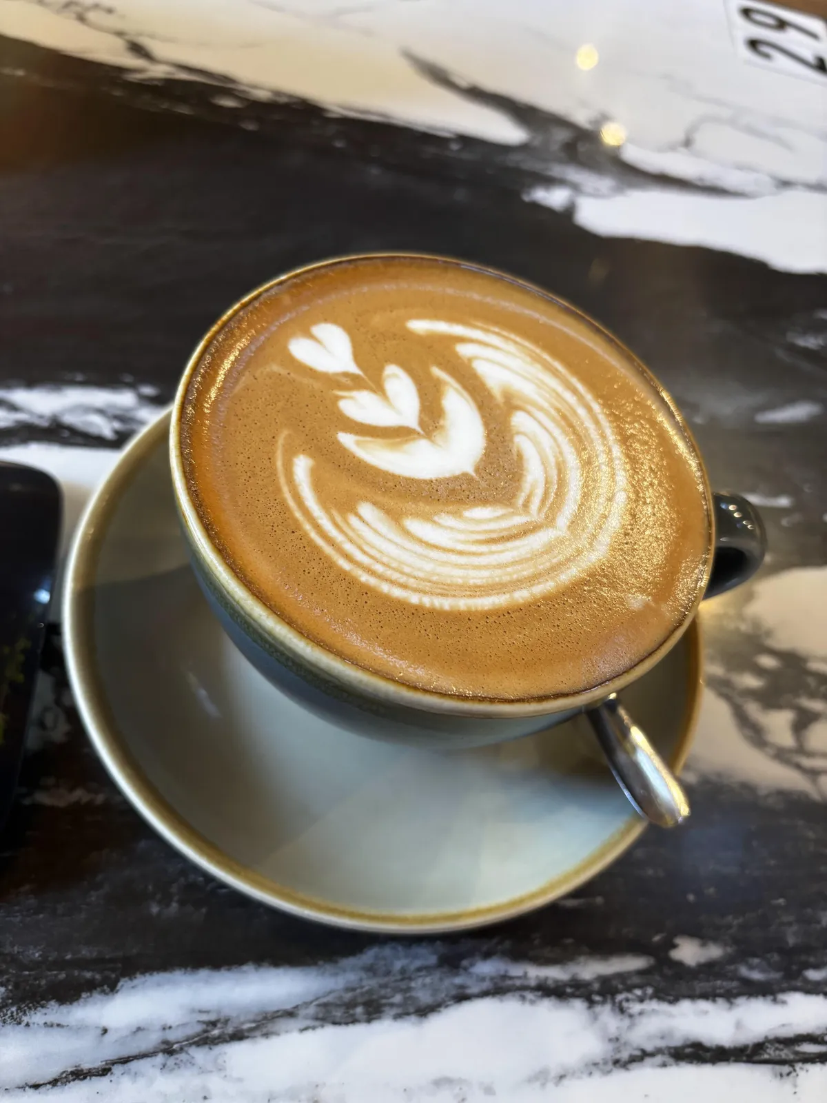 A detailed event agenda displayed on a digital tablet, surrounded by colorful sticky notes and pens on a wooden desk, with a hand pointing at the schedule. The scene is bright, organized, and modern, emphasizing planning and structure.