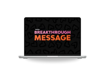 Laptop screen displaying the Wanda Lambert Breakthrough Message branding