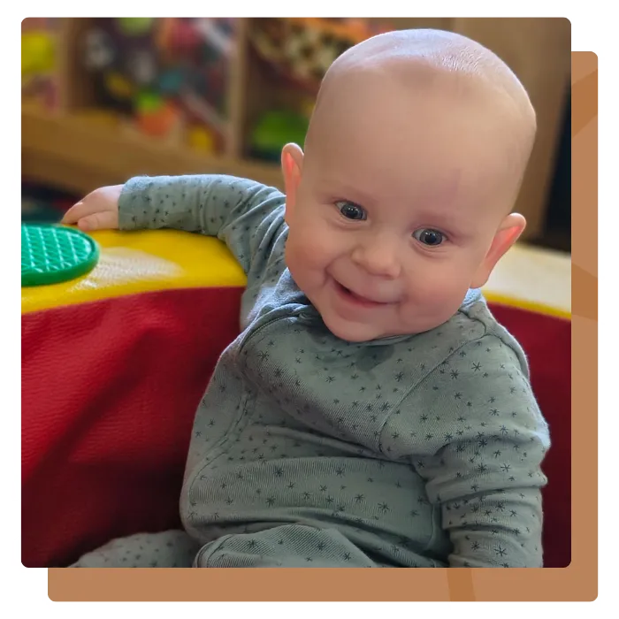 child painting in childcare