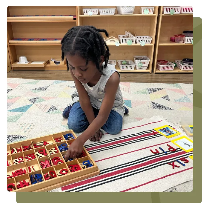 child painting in childcare