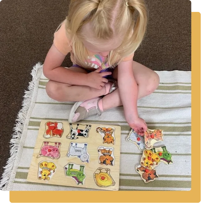 Child playing in childcare facility