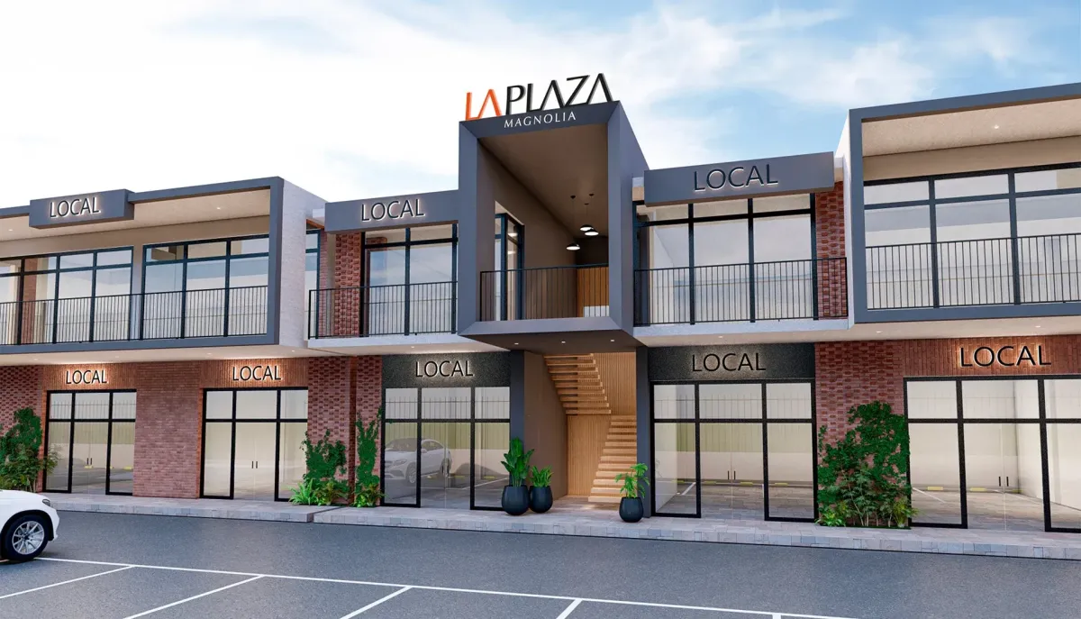 Fachada panorámica de LaPlaza Magnolia al atardecer con arquitectura moderna y logotipo destacado