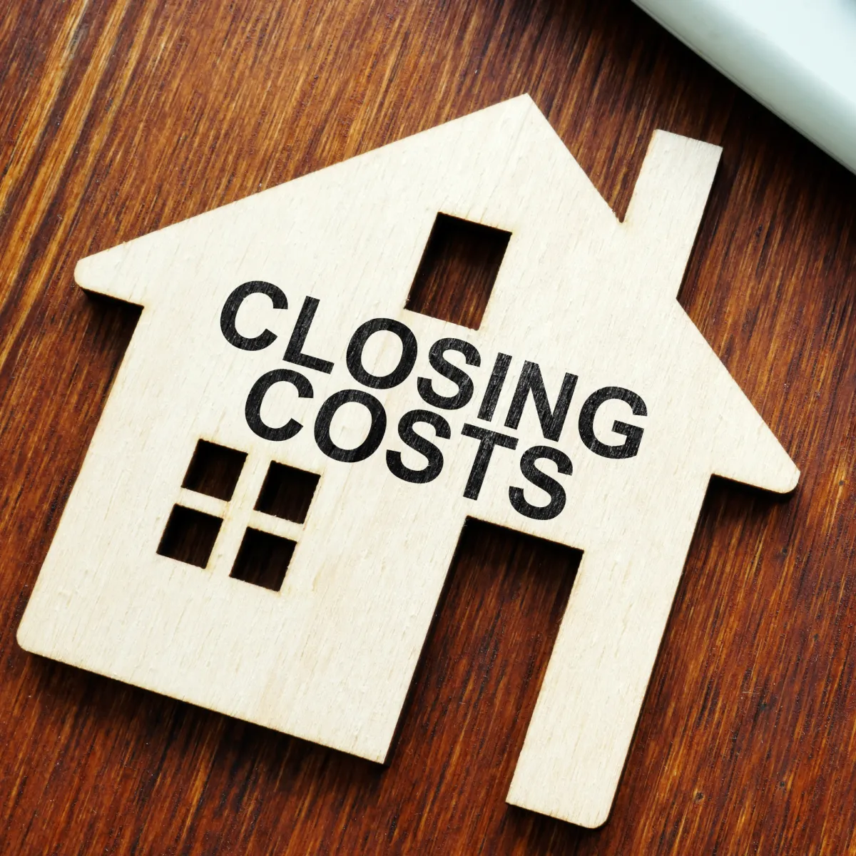 Photo of a Home with Closing Costs written on it