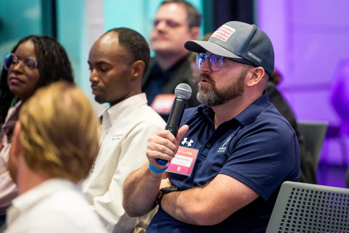 Gregory speaking at Opportunity Machine