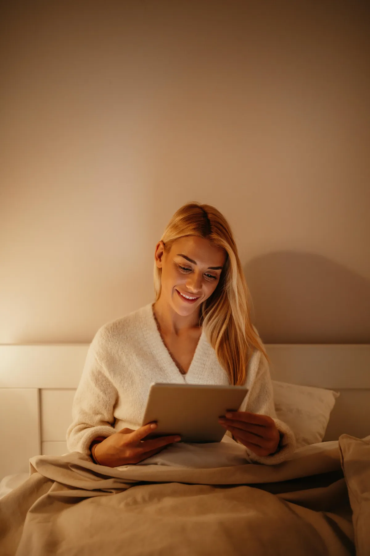Happy young mother holding her precious baby