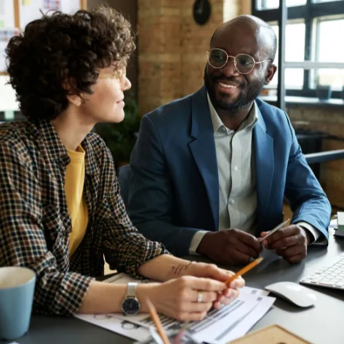 Executive leaders working with a strategic advisor on complex decisions