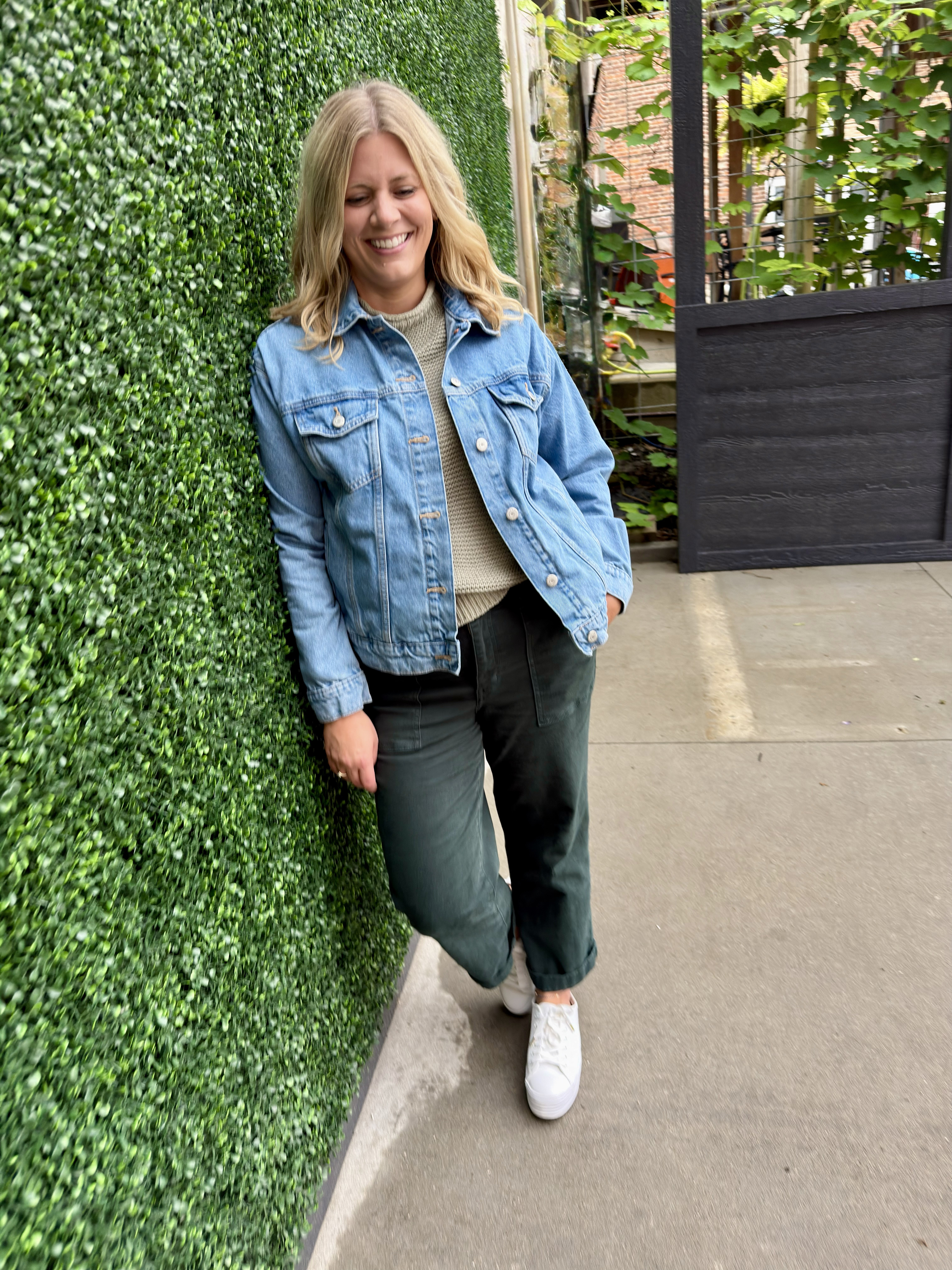 Megan Thole in a thrifted speaking outfit reflecting her authentic personal style