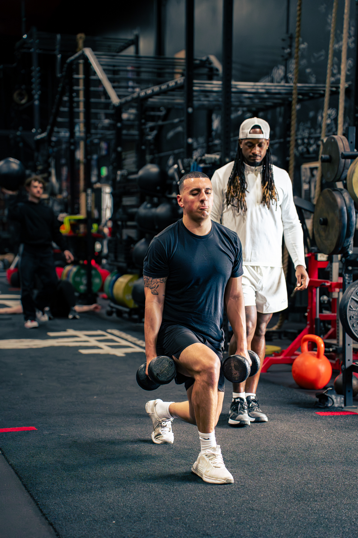 Athlete engaged in rigorous barbell training at MAHC Wellness private performance studio
