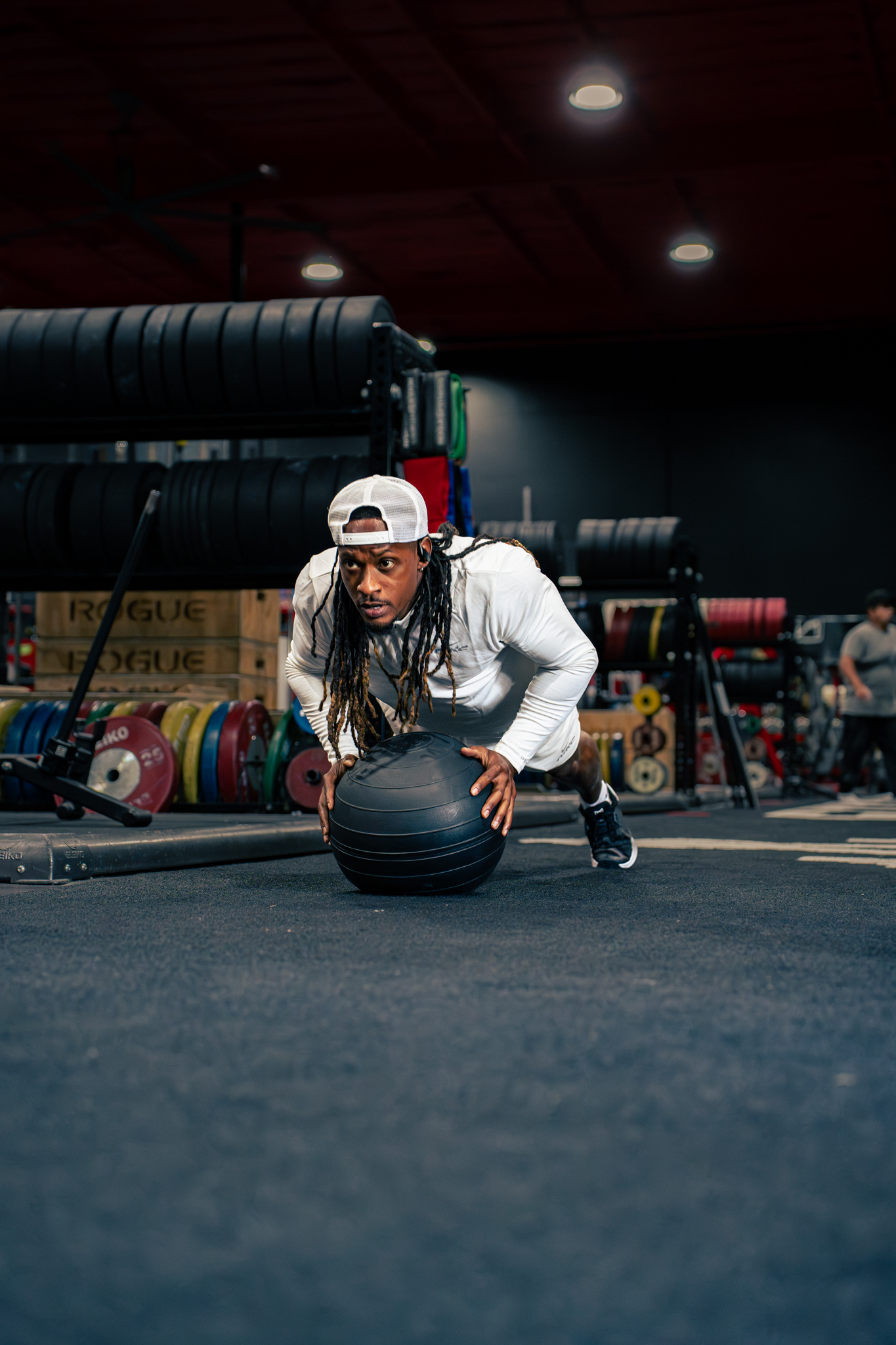Gritty intense athletic discipline and barbell training session