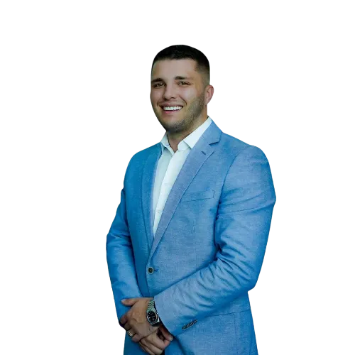 Friendly licensed Medicare agent in navy blazer, smiling