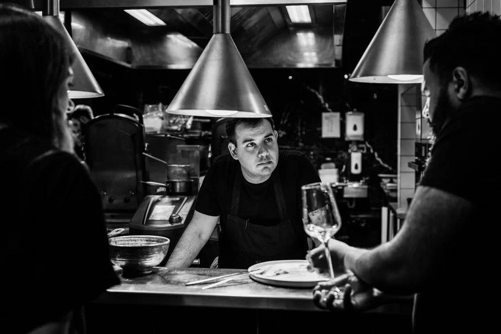 Chef working in a minimalist kitchen