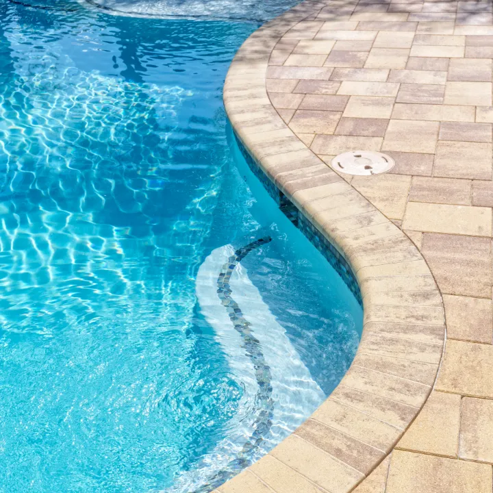 Paver Sealing a Pool Deck