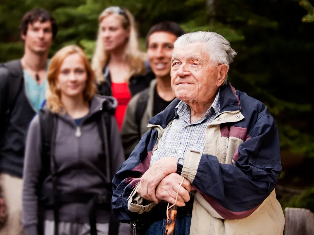 woman placing sticky notes on wall