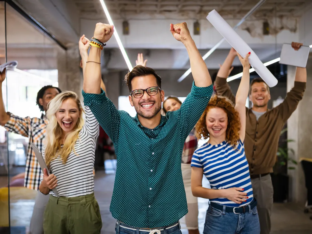 woman placing sticky notes on wall