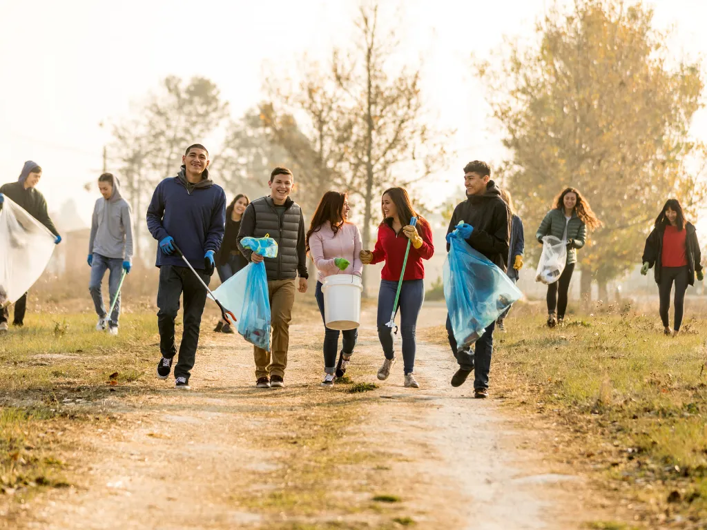 woman placing sticky notes on wall