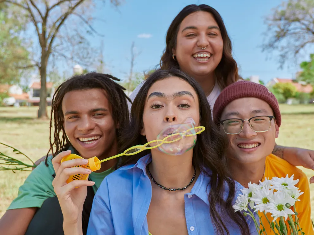 woman placing sticky notes on wall