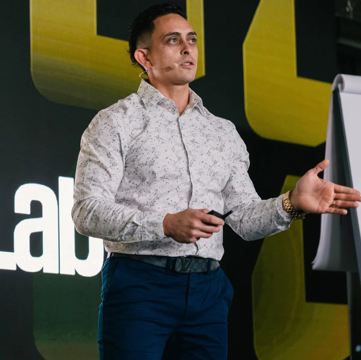 Jonathan Montoya speaking on stage