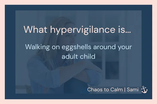 Mum standing alone in her kitchen looking thoughtful, walking on eggshells around her adult child