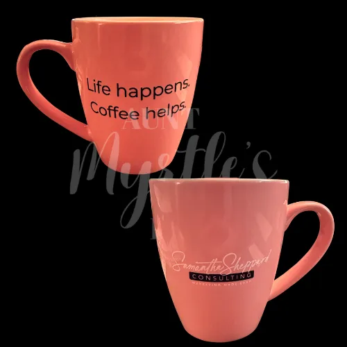Pink coffee mug branded with Samantha Sheppard Consulting on the one side and "Life happens. Coffee helps." on the other side.