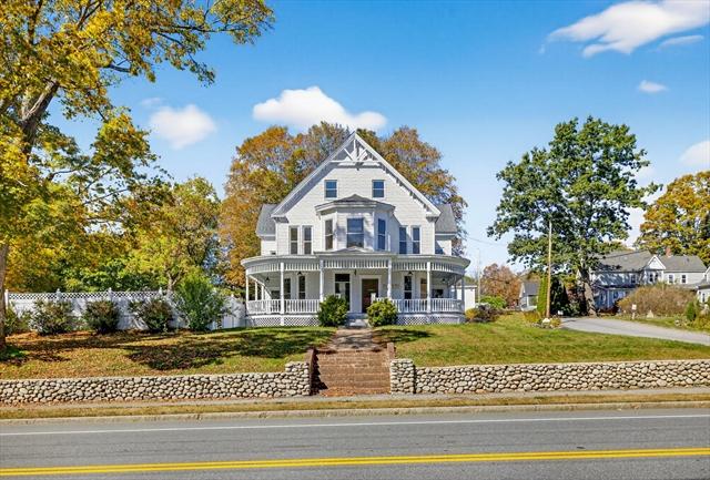 Multi-level deck with stairs built on hillside lot in East Derry NH