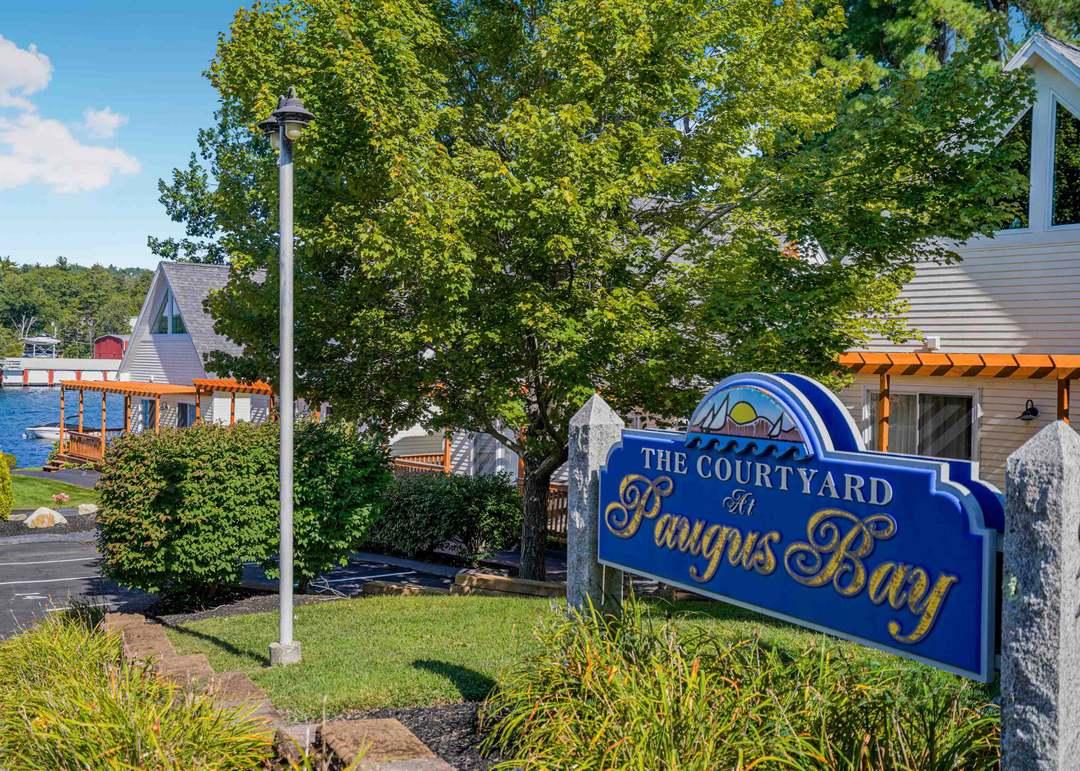 Durable composite deck with wide stairs near Weirs Beach in Laconia NH