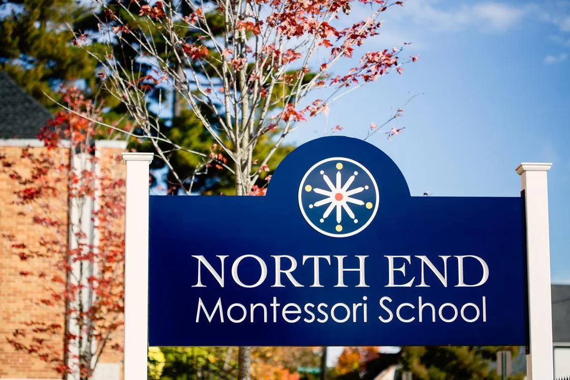 Classic cedar porch deck with decorative railings in North End Manchester NH  Tile 2