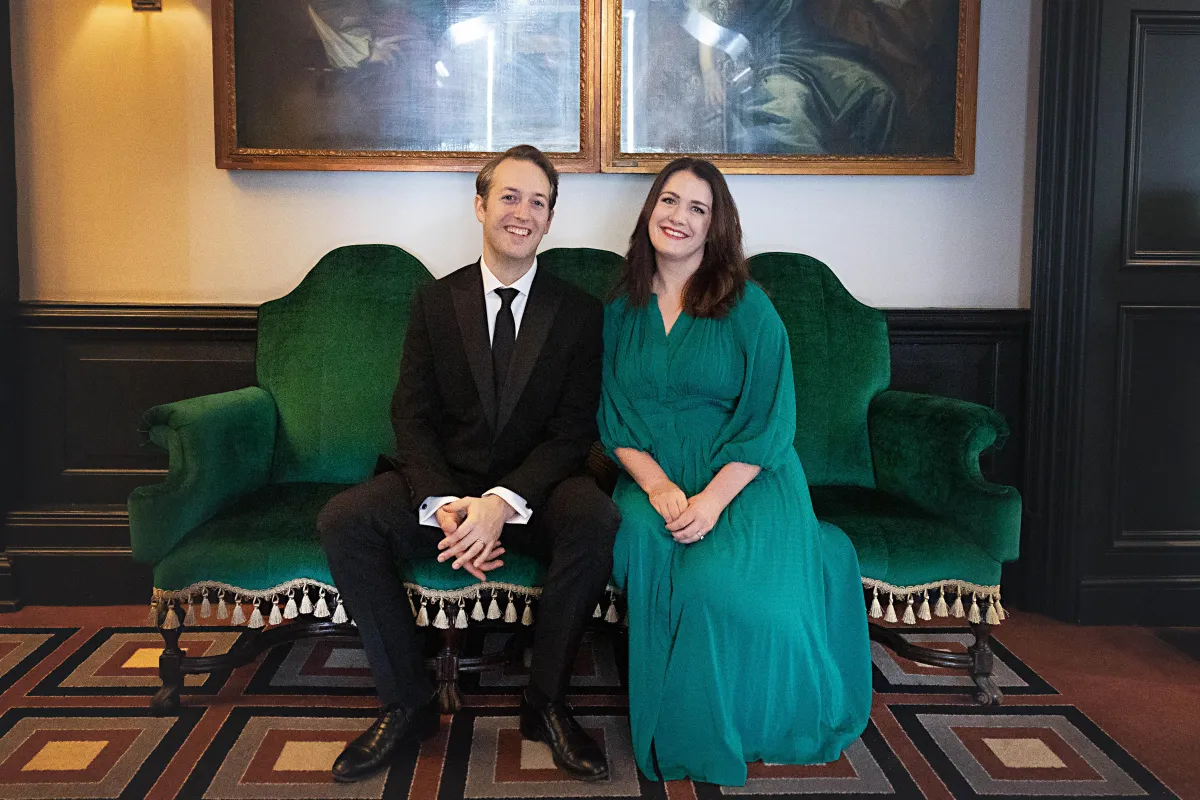 Woman dancing while cleaning with a mop