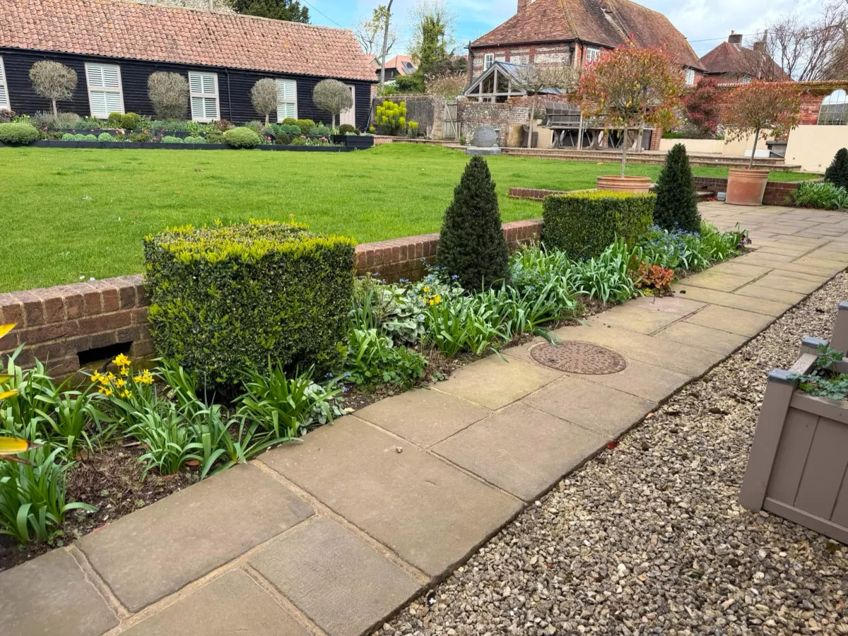 Premium garden lawn and planting bed example
