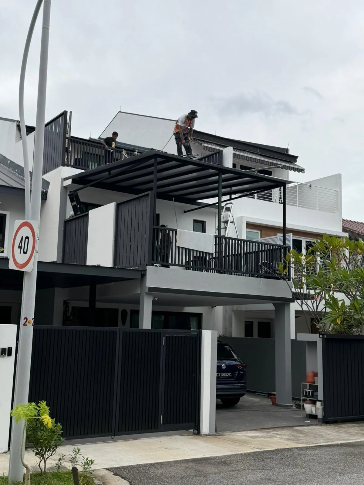 Pergola roof structure installed on the rooftop of a landed home, providing shelter for the outdoor terrace.