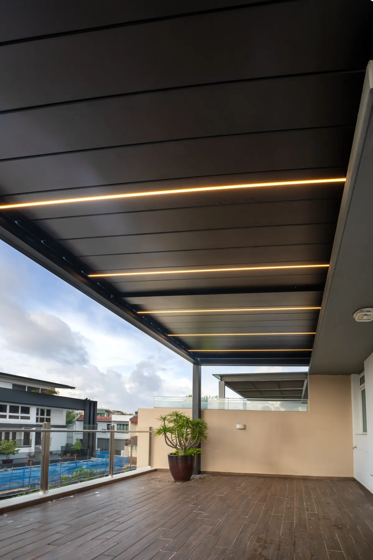 black-aluminum-pergola-led-lights-landed-property