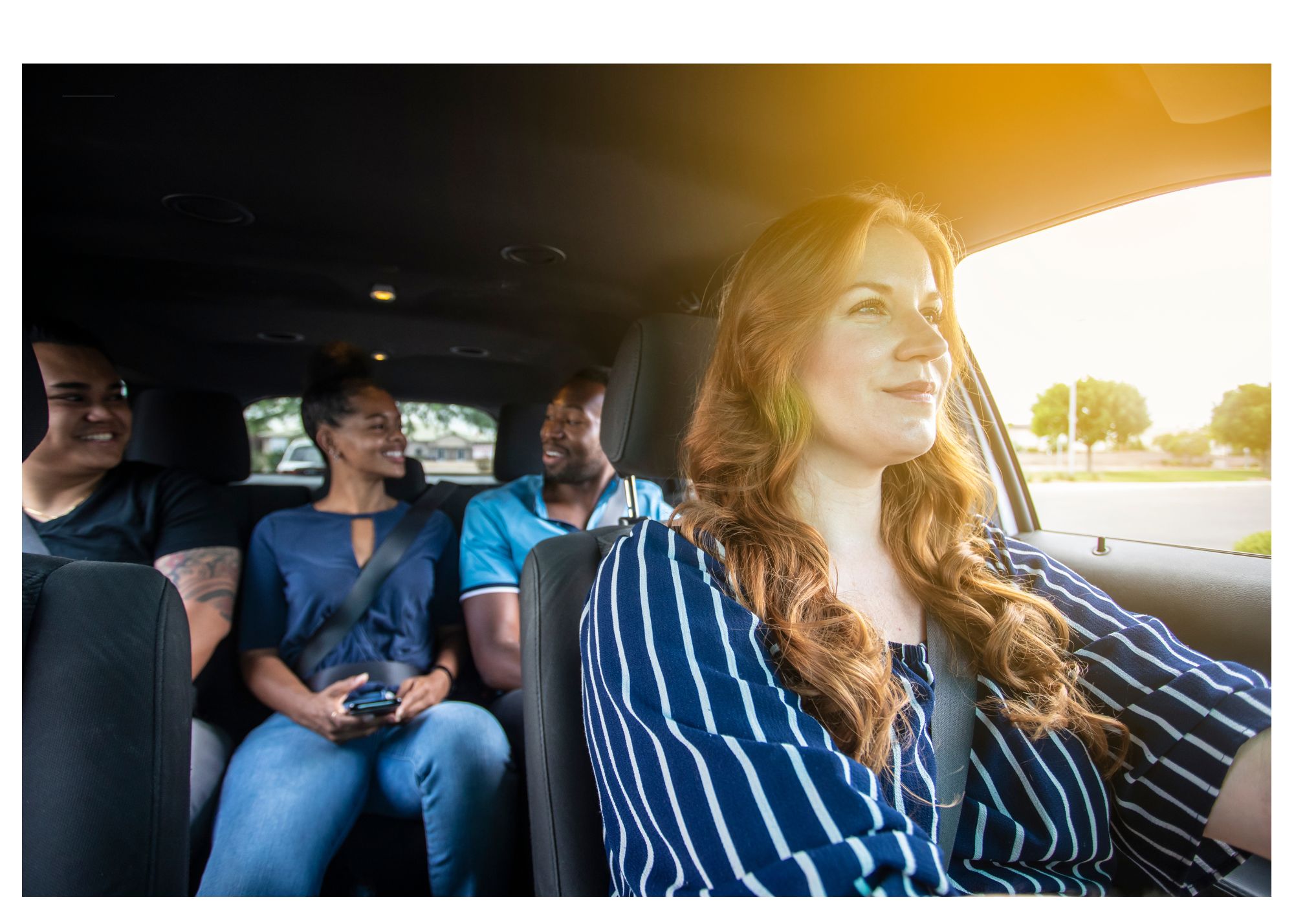 group of people setting up campfire