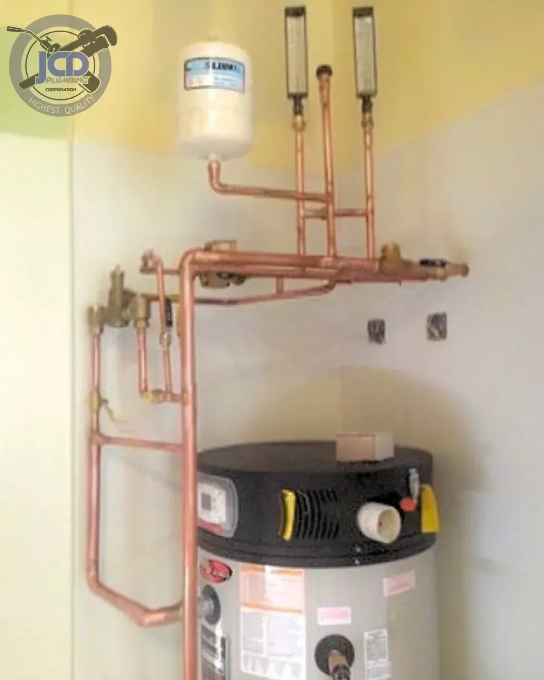 Residential water heater installation with precision copper piping by a licensed plumber