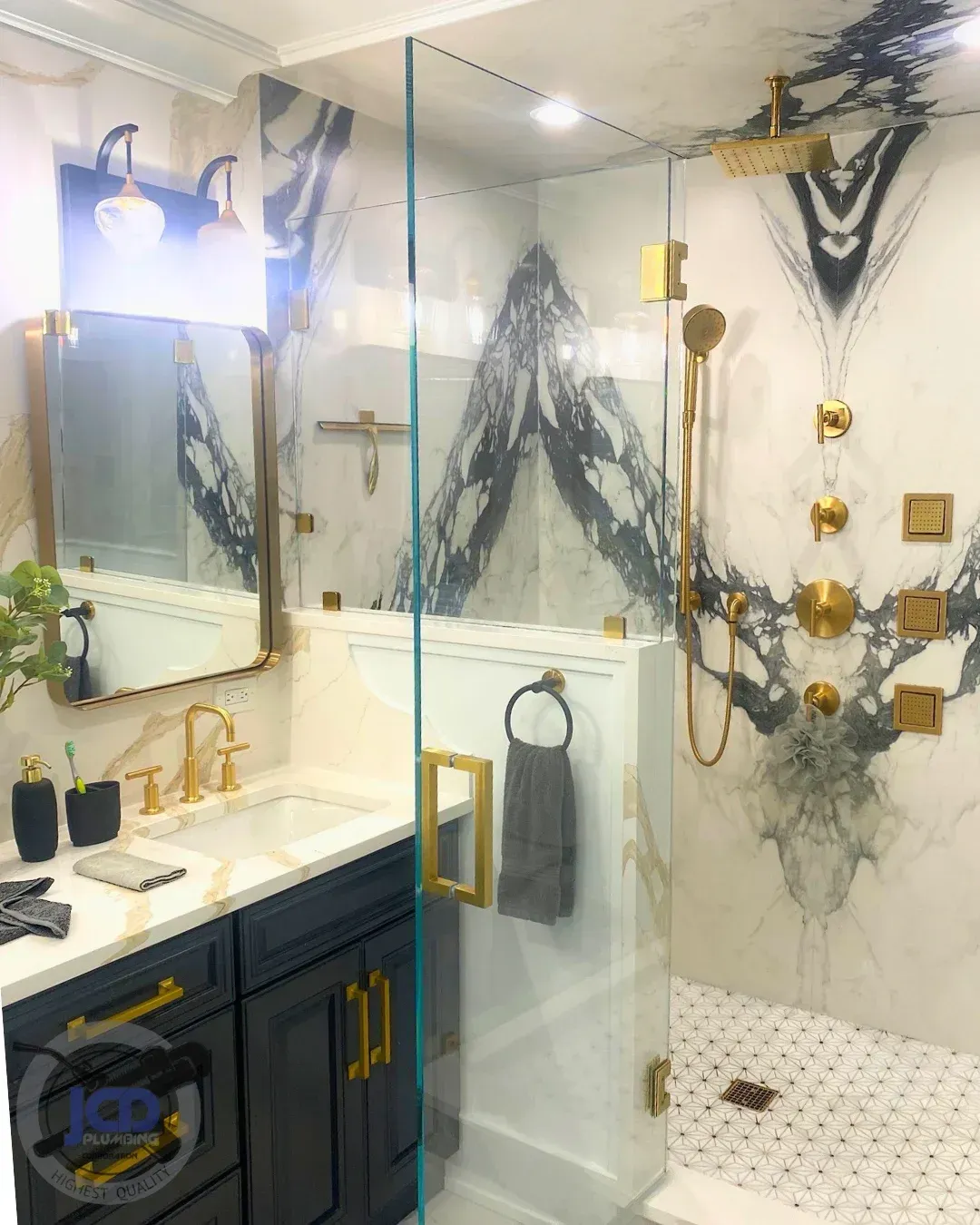 High-end bathroom renovation with custom shower plumbing and vanity installation by JCD Plumbing Corporation