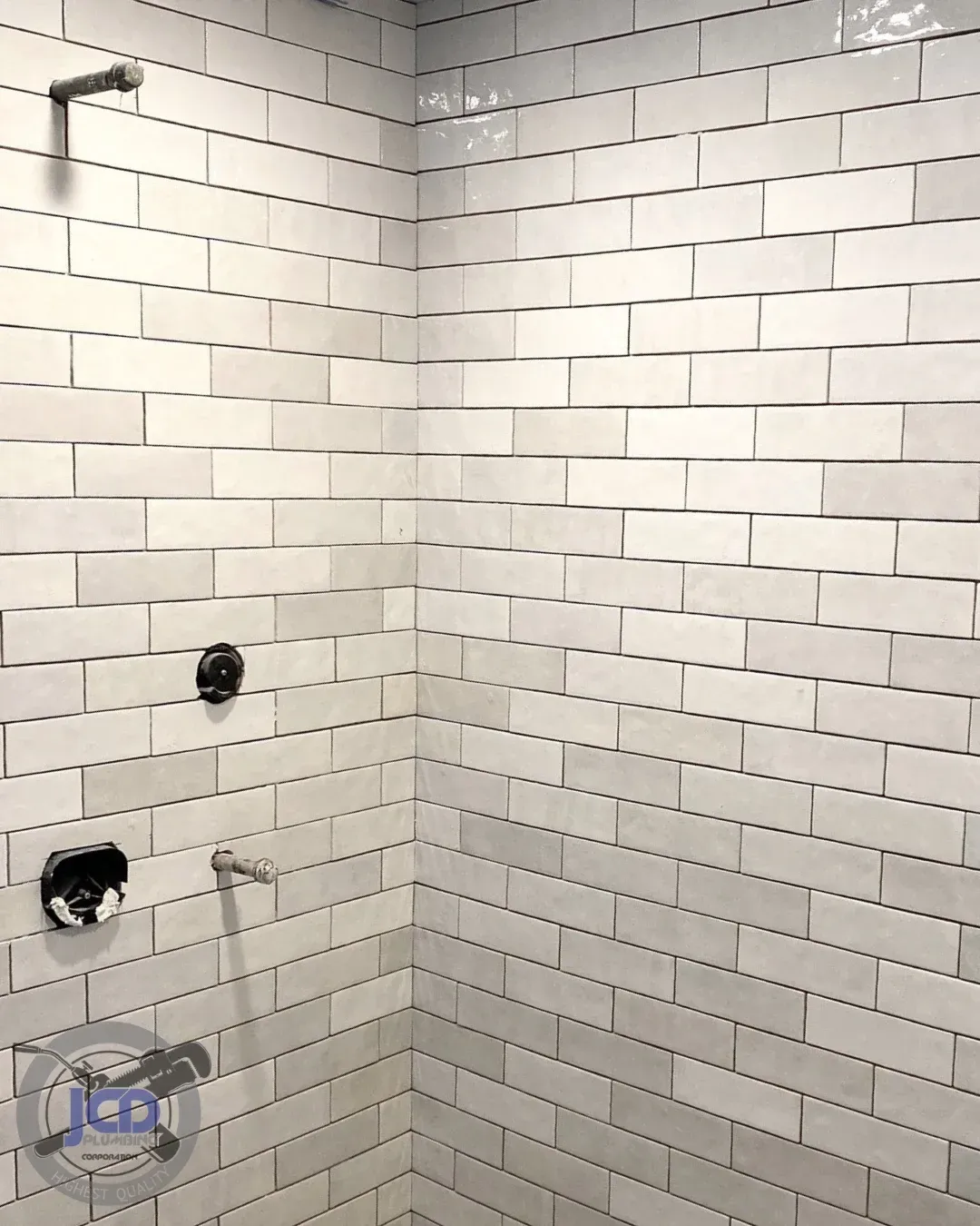 Precision shower plumbing installation completed during a residential bathroom remodel