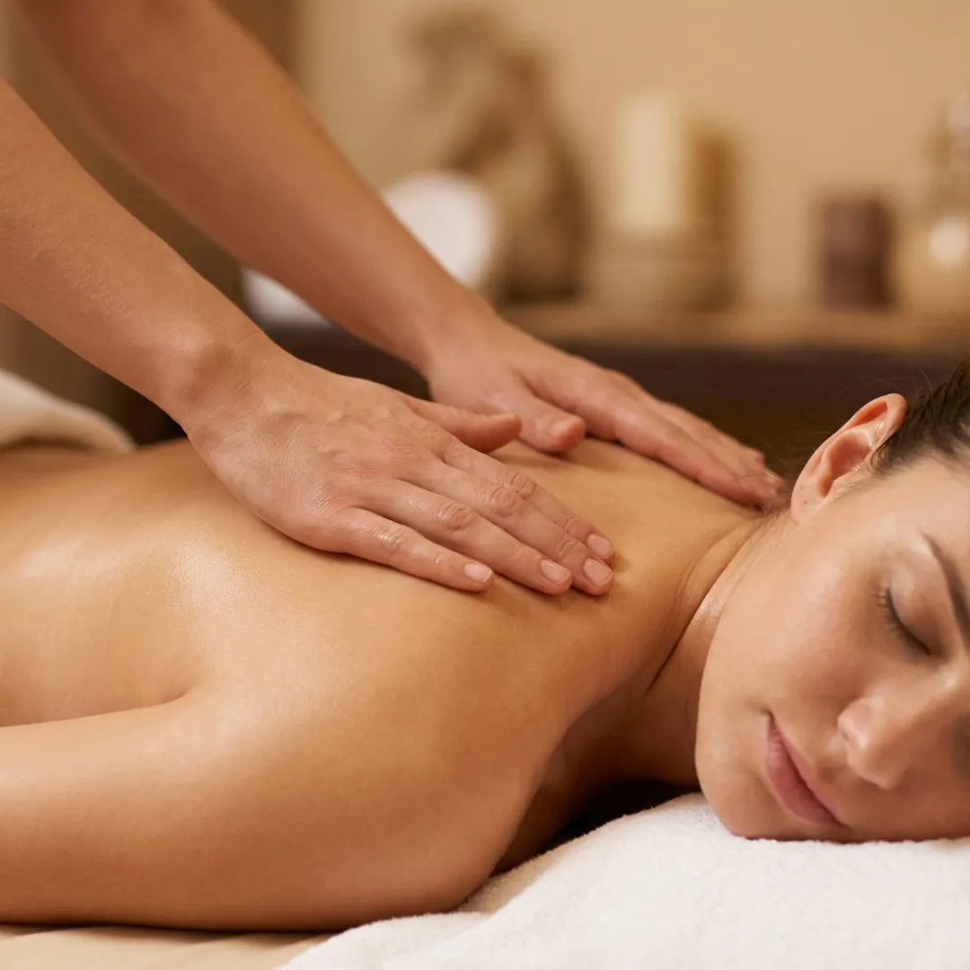 Therapist performing remedial massage on upper back at Wonderful Massage Holmview